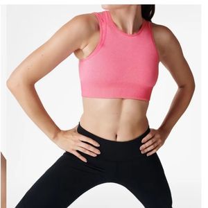 SWEATY BETTY Illusion Seamless Sports Bra in 
Camellia Pink size small NEW!